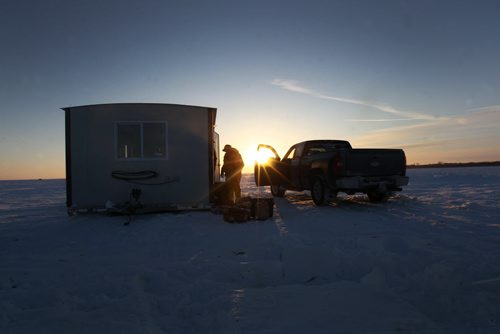 Arriving at the ice hut on first light on Lake Winnipeg aprx 45 km north of Winnipeg- - see Mellisa Tait/Bryksa ice fishing feature story  Apr, 2015   (JOE BRYKSA / WINNIPEG FREE PRESS)