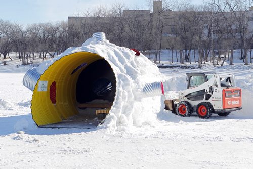 The Red River skating trail is now closed. Kids play thing was being dug out to be removed. BORIS MINKEVICH/WINNIPEG FREE PRESS MARCH 9, 2015