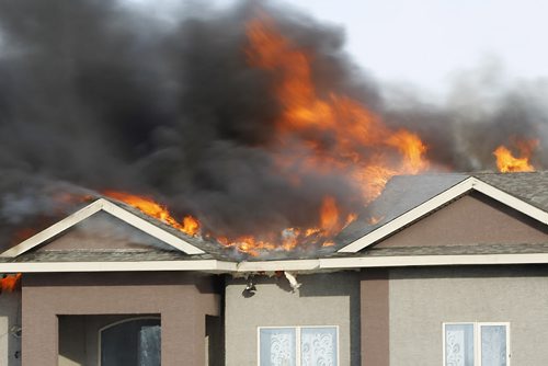 March 9, 2015 - 150309  -  Fire destroys a home at 3169 Pipeline Road Monday, March 9, 2015. John Woods / Winnipeg Free Press