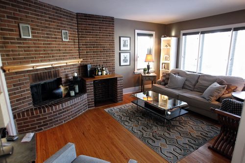 Re-sale Home at 266 Queenston Street Living room with fireplace.  150310 March 10, 2015 Mike Deal / Winnipeg Free Press