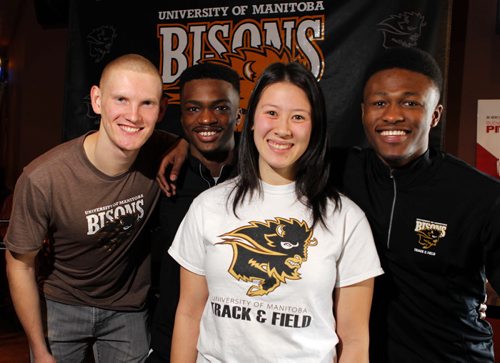SPORTS - 2015 Bison Track & Field CIS Championship - Athlete Roster. Left to right - Eric Guy, Oyinko Akinola, Melissa Richards, and Alhaji Mansaray pose for a photo at the press conference at Smitty's Restaurant south Pembina. BORIS MINKEVICH/WINNIPEG FREE PRESS MARCH 10, 2015