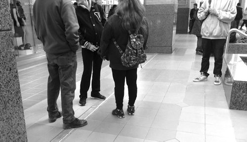 People congregate and talk  in centre court are at  at Portage Place Mall Tuesday afternoon, See story on malls becoming place for pimps to recruit.   March 10, 2015  / Winnipeg Free Press.