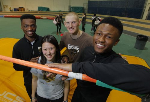 SPORTS - 2015 Bison Track & Field CIS Championship - Athlete Roster. Left to right -Oyinko Akinola, Melissa Richards, Eric Guy, and Alhaji Mansaray pose for a photo at Max Bell Centre during a break at track practice. BORIS MINKEVICH/WINNIPEG FREE PRESS MARCH 10, 2015