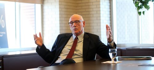 Red River College board of governors chair Lloyd Schreyer as he talks to Nick Martin for upcoming story. March 10, 2015 - (Phil Hossack / Winnipeg Free Press)