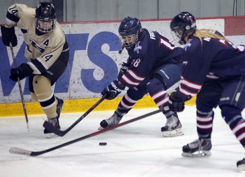 SPORTS - The 3rd annual Female World Sport School Challenge (FWSSC), hosted by St. Marys Academy (SMA), takes place at the MTS Iceplex from March 12-15, 2015. Games begin at 9:30 AM on Thursday, March 12 and conclude with the Gold medal game on Sunday, March 15 at 1:30 PM. Here St. Mary;s Academy in dark blue celebrate the win 2-0 over Banff. L-R #14 Andie Romanuik, #18 Kayla Friesen and #7 Meike Meilleur. BORIS MINKEVICH/WINNIPEG FREE PRESS MARCH 12, 2015