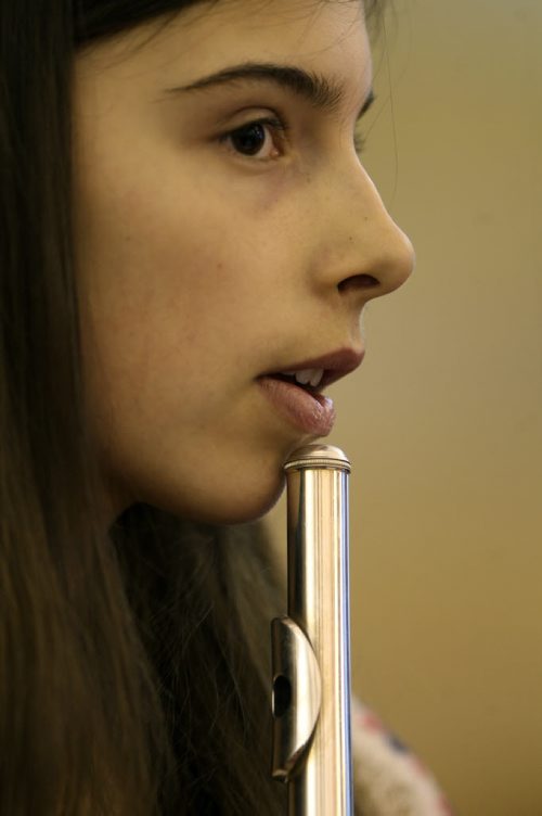 Morgan Sawchyn  played the flute in Class 5170 Grades 7-8 competing in the Winnipeg Music Festival at Fort Garry united Church on Point Road- She Listens to adjudicator Dr Amy Hamilton , not pictured, after her performance- Standup Photo- Mar 13, 2015   (JOE BRYKSA / WINNIPEG FREE PRESS)