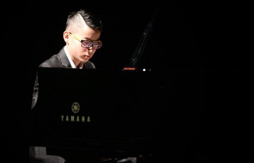 Michael Guan plays classical style piano during the Winnipeg Music Festival at the Winnipeg Art Gallery, Saturday, March 14, 2015. (TREVOR HAGAN/WINNIPEG FREE PRESS)