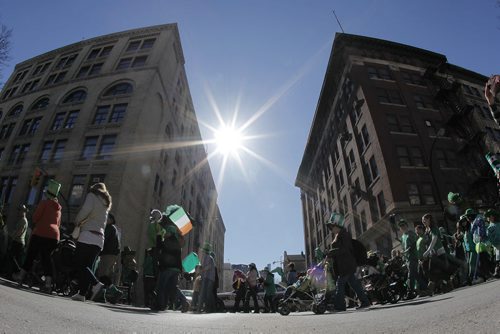 March 14, 2015 - 150314  -  Winnipeggers come out to enjoy the fourth annual St. Patrick's Day Parade and the great weather Saturday, March 14, 2015. John Woods / Winnipeg Free Press