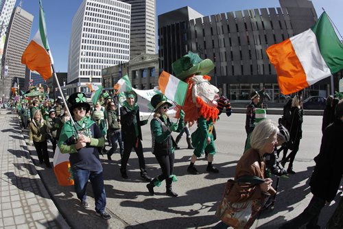 March 14, 2015 - 150314  -  Winnipeggers come out to enjoy the fourth annual St. Patrick's Day Parade and the great weather Saturday, March 14, 2015. John Woods / Winnipeg Free Press