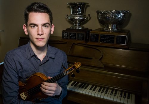 Gregory Lewis winner of the Aikins Memorial Trophy at his home the day after winning the Music Festival award. 150315 - Sunday, March 15, 2015 -  (MIKE DEAL / WINNIPEG FREE PRESS)