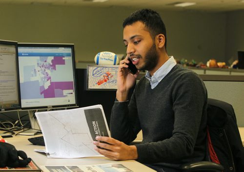 Inayat Singh poses for a photo at his work area in the news room. BORIS MINKEVICH/WINNIPEG FREE PRESS MARCH 16, 2015