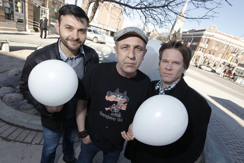 March 16, 2015 - 150316  -  Documentary film maker Nihad Ademi (C) with WSO's Alexander Mickelthwate (R) and Frank Albo are photographed Monday, March 16, 2015 in Osborne Village. Ademi plans on making, White Balloon, a documentary about the nightmare of his imprisonment in a Bosnian concentration camp with the help of filmmaker Guy Maddin, WSO music director Alexander Mickelthwate and Frank Albo.  Mickelwaite. John Woods / Winnipeg Free Press