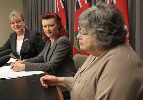 Labour and Immigration Minister Erna Braun, Minister responsible for the Office of the Fire Commissioner, Left, and Health Minister Sharon Blady, centre, with Gail Finkel Manitoba Person with Disabilities following news-conference at Manitoba Legislature Tuesday where it was announced that the Manitoba government will have sprinklers in all seniors homes and hospitals in the province by 2025-  A 7 Million project is already underway to install sprinklers in five personal care homes and one hospital in 2015-16- See Bruce Owen story- Mar 17, 2015   (JOE BRYKSA / WINNIPEG FREE PRESS)