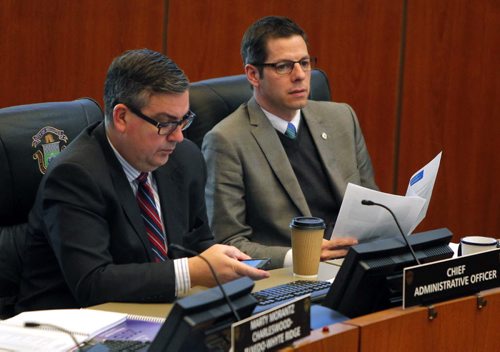 (L-R) Winnipeg CAO Michael Jack and Mayor Brian Bowman at City Hall. Public groups were voicing their thoughts on the the proposed budget today. BORIS MINKEVICH/WINNIPEG FREE PRESS MARCH 17, 2015