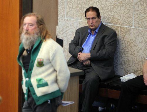 Right,  David Sanders waits for left, Jordan Van Sewell to speak at City Hall. Public groups were voicing their thoughts on the the proposed budget today. BORIS MINKEVICH/WINNIPEG FREE PRESS MARCH 17, 2015