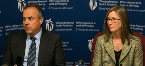 Real Cloutier, VP of WRHA and Liz Loewen, Director, Coordination of Care with Manitoba eHealth, speaks to media at a press conference Tuesday afternoon, after a pharmacist from the Grace Hospital was found to have accessed 56 private medical records of patients because he was "curious."  150317 - Tuesday, March 17, 2015 - (Melissa Tait / Winnipeg Free Press)