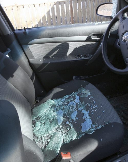 - one of two windows smashed out in River Heights last night. March 18, 2015   (NO CREDIT) Winnipeg Free Press