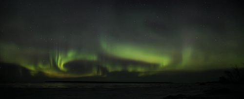 Aurora Borealis over Lake Winnipeg at Victoria Beach early Thursday morning. A "severe" G4 geomagnetic storm was tracked Tuesday morning by The U.S. National Oceanic and Atmospheric Administration's Space Weather Prediction Centre. The storm of solar rays soaring into the Earth's atmosphere led to a high activity of northern lights across much of North America. 150319 - Thursday, March 19, 2015 - (Melissa Tait / Winnipeg Free Press)