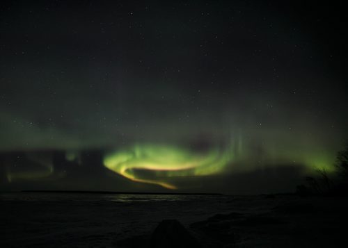 Aurora Borealis over Lake Winnipeg at Victoria Beach early Thursday morning. A "severe" G4 geomagnetic storm was tracked Tuesday morning by The U.S. National Oceanic and Atmospheric Administration's Space Weather Prediction Centre. The storm of solar rays soaring into the Earth's atmosphere led to a high activity of northern lights across much of North America. 150319 - Thursday, March 19, 2015 - (Melissa Tait / Winnipeg Free Press)
