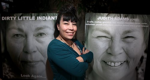 KC Adams poses at a launch for her work with a diptych portrait of Judith Adams (her mother) which makes up one in her series of portraits called "Perception Series". See Geoff Kirbyson story. March 19, 2015 - (Phil Hossack / Winnipeg Free Press)