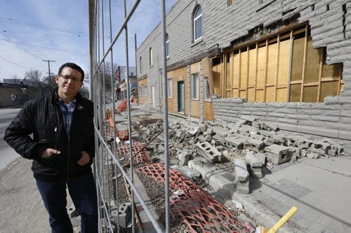 Sal Infantino with the damaged Hood Block at 543 Sargent Avenue at Langside Street he owns  that is set to be demolished.  He also owns the neighbouring X-Cues Billiards and Cafe at 551 Sargent Avenue.  Christian Cassidy "This Was Winnipeg" column  Wayne Glowacki/Winnipeg Free Press March 20 2015
