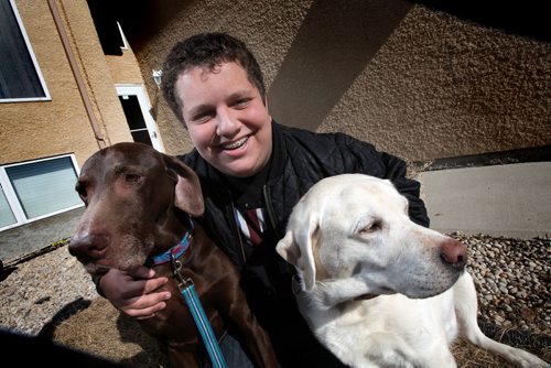 PET PAGE ; Josh Muyal and his two dogs, Cooper (LEFT) and Casey. Josh is a 16-year-old Grade 11 student at Gray Academy and instead of being obsessed with hockey and video games, he devotes his time to raising money for abandoned, neglected and abused dogs. Josh has created an advocacy group called Dogs Who Need A Home, and it's goal is to hold monthly fundraising events in support of local dog rescue organizations. They've held a couple so far with more planned for the summer. This all began because his family has been fostering dogs for about eight years, and Josh has seen some severely abused and neglected animals pass through his home in that time. March 20, 2015 - (Phil Hossack / Winnipeg Free Press
