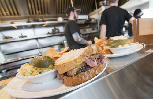 150320 Winnipeg - DAVID LIPNOWSKI / WINNIPEG FREE PRESS  Sherbrook Street Delicatessen Proprietor Jon Hochman at his restaurant Friday March 20, 2015.