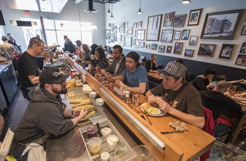 150320 Winnipeg - DAVID LIPNOWSKI / WINNIPEG FREE PRESS  Sherbrook Street Delicatessen Proprietor Jon Hochman at his restaurant Friday March 20, 2015.