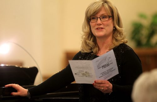 Donna Fletcher, one of the adjudicator's at the 97th Annual Winnipeg Music Festival, announces the winner of the Ladies' Orange Benevolent Association Trophy for the Girls under 14 category Saturday at Churchill Park United Church.  For Tuesday's photo page  Ruth Bonneville / Winnipeg Free Press March 21, 2015