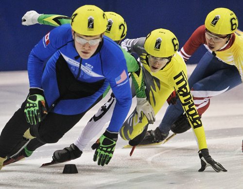 Manitoba's Jan Verbruggen (69), second from right, during a race at Speed Skating Canadas National Western Short Track Championships Sunday afternoon in Selkirk, MB.   150322 March 22, 2015 Mike Deal / Winnipeg Free Press