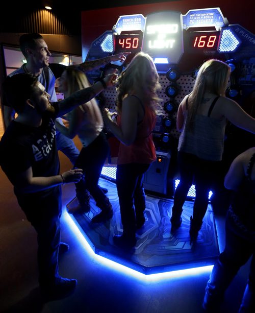 People play Speed of Light, at Reset Interactive Ultralounge, Saturday February 21, 2015. (TREVOR HAGAN/WINNIPEG FREE PRESS)