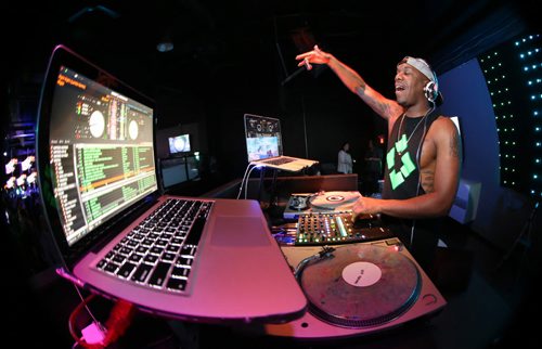 Kirk St.Cyr, aka 4Korners, the official DJ for the Toronto Raptors at Reset Interactive Ultralounge, Saturday, March 7, 2015. (TREVOR HAGAN/WINNIPEG FREE PRESS)