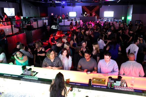 The crowd inside Reset Interactive Ultralounge while Kirk St.Cyr, aka 4Korners, the official DJ for the Toronto Raptors plays, Saturday, March 7, 2015. (TREVOR HAGAN/WINNIPEG FREE PRESS)