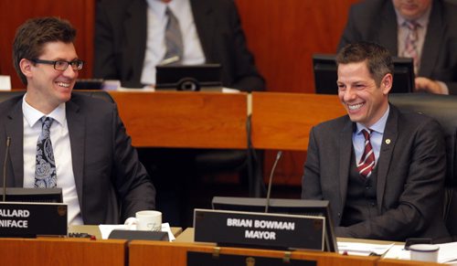 City budget talks at city hall. Matt Allard and Brian Bowman share a laugh. BORIS MINKEVICH/WINNIPEG FREE PRESS MARCH 23, 2015