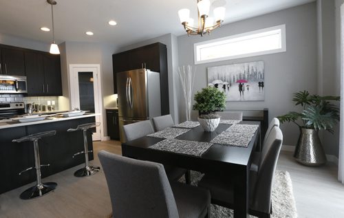 Homes. 81 Angela Everts Drive in Crocus Meadows, Derek MacDonald with Qualico Homes is the contact. Dining area and kitchen.Todd Lewys story Wayne Glowacki/Winnipeg Free Press March 23 2015