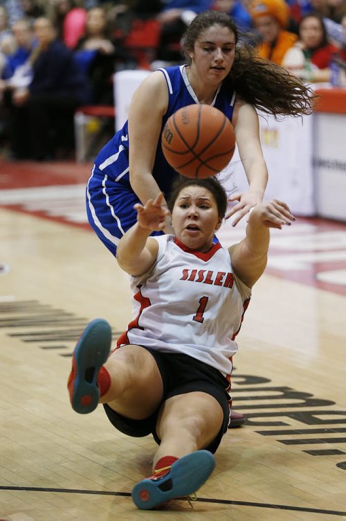 March 23, 2015 - 150323  -  Sisler Spartans' Sentilla Bubb (1) plays the ball after stealing it from Oak Park Raiders' Jessica Dyck (5) in the girls Manitoba High School AAAA Basketball Championship game at the U of Winnipeg Monday, March 23, 2015. John Woods / Winnipeg Free Press