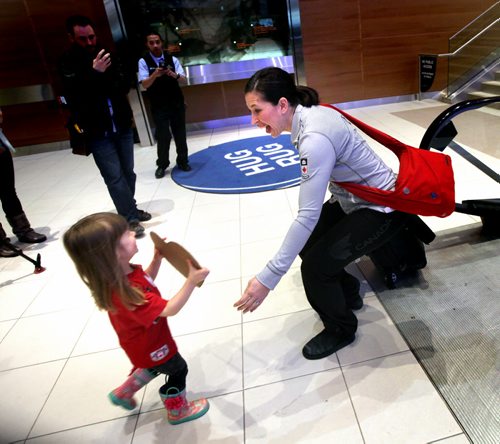 Welcoming Committee -  Team Canada's curling mom Jennifer Officer is met by her her patiently long waiting daughter Camryn (3) as she arrived home from Japan with her silver championship medal. See Paul Wiecek's story. March 23, 2015 - (Phil Hossack / Winnipeg Free Press)