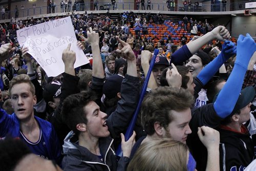 March 23, 2015 - 150323  -  Oak Park Raiders fans gesture towards St Paul's fans after defeating the St Paul's Crusaders in the boys Manitoba High School AAAA Basketball Championship game at the U of Winnipeg Monday, March 23, 2015. John Woods / Winnipeg Free Press