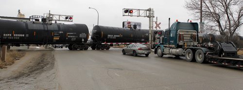 BUILD CANADA -- There was a council seminar this morning to determine priorities for four major projects, in order to get funding from Ottawa and the province. Photographed here one of the projects: Marion underpass and widening (Marion/Archibald). Rail crossing. BORIS MINKEVICH/WINNIPEG FREE PRESS MARCH 24, 2015
