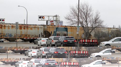 BUILD CANADA -- There was a council seminar this morning to determine priorities for four major projects, in order to get funding from Ottawa and the province. Photographed here one of the projects: Marion underpass and widening (Marion/Archibald). Rail crossing. BORIS MINKEVICH/WINNIPEG FREE PRESS MARCH 24, 2015