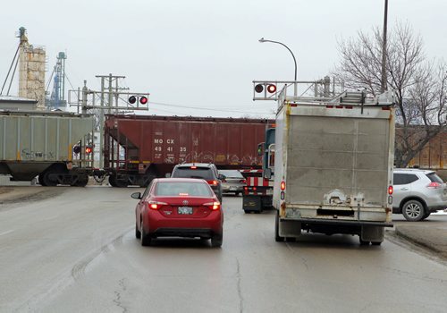 BUILD CANADA -- There was a council seminar this morning to determine priorities for four major projects, in order to get funding from Ottawa and the province. Photographed here one of the projects: Marion underpass and widening (Marion/Archibald). Rail crossing. BORIS MINKEVICH/WINNIPEG FREE PRESS MARCH 24, 2015