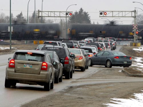 BUILD CANADA -- There was a council seminar this morning to determine priorities for four major projects, in order to get funding from Ottawa and the province. Photographed here one of the projects: Waverley underpass for this rail crossing. BORIS MINKEVICH/WINNIPEG FREE PRESS MARCH 24, 2015