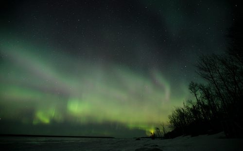 The lights of the Aurora Borealis over Lake Winnipeg at Victoria Beach early morning March 19. A geomagnetic storm sent solar rays soaring into the Earth's atmosphere, leading significant northern lights activity that was visible across much of North America. 150319 - Thursday, March 19, 2015 - (Melissa Tait / Winnipeg Free Press)