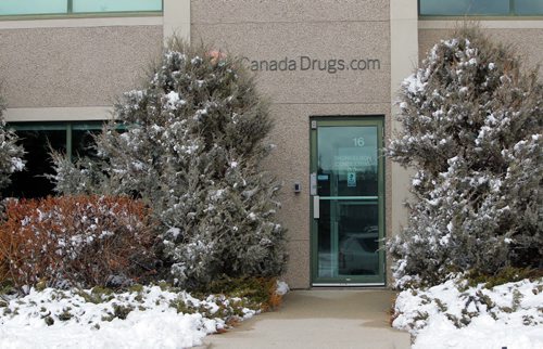 Canada Drugs .com at Terracon Place. Police seen going into the building. BORIS MINKEVICH/WINNIPEG FREE PRESS MARCH 25, 2015
