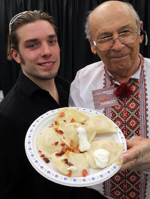 PERFECT PIEROGIES at the Home Expression Show at the convention centre. James Aitkenhead and Lawrence Porhownik with some product they are sampling to the public. BORIS MINKEVICH/WINNIPEG FREE PRESS MARCH 27, 2015