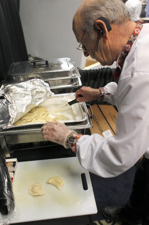 PERFECT PIEROGIES at the Home Expression Show at the convention centre. Lawrence Porhownik with some product for taisting. BORIS MINKEVICH/WINNIPEG FREE PRESS MARCH 27, 2015