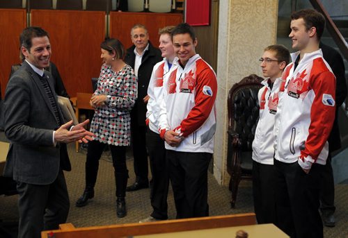 LOCAL - Mayor Sports Excellence. Left to right - Mayor Bowman presented the Mayors Award for Sports Excellence to the 2015 Canadian Junior Mens curling team at city Hall Council Building. Canadian Junior Mens curling team: left to right  Braden Calvert - Skip, Kyle Kurz  Third, Lucas Van Den Bosch  Second, Brendan Wilson  Lead. BORIS MINKEVICH/WINNIPEG FREE PRESS MARCH 27, 2015