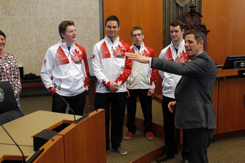 LOCAL - Mayor Sports Excellence. Left to right - Mayor Bowman presented the Mayors Award for Sports Excellence to the 2015 Canadian Junior Mens curling team at city Hall Council Building. Canadian Junior Mens curling team: left to right  Braden Calvert - Skip, Kyle Kurz  Third, Lucas Van Den Bosch  Second, Brendan Wilson  Lead. BORIS MINKEVICH/WINNIPEG FREE PRESS MARCH 27, 2015