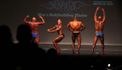 Male competitors compete in the Masters category during the Manitoba Bodybuilding Association Provincial Qualifier competition at Pantages Saturday night.  March 28, 2015 Ruth Bonneville / Winnipeg Free Press.