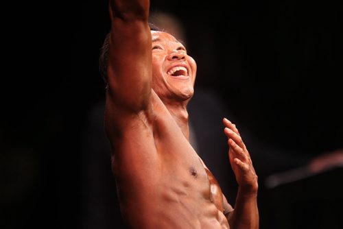 Robert Saysana celebrates after coming in 1st place in the Men's Physique - class B category at the Manitoba Bodybuilding  Association Provincial Qualifier competition at Pantages Saturday night.  March 28, 2015 Ruth Bonneville / Winnipeg Free Press.